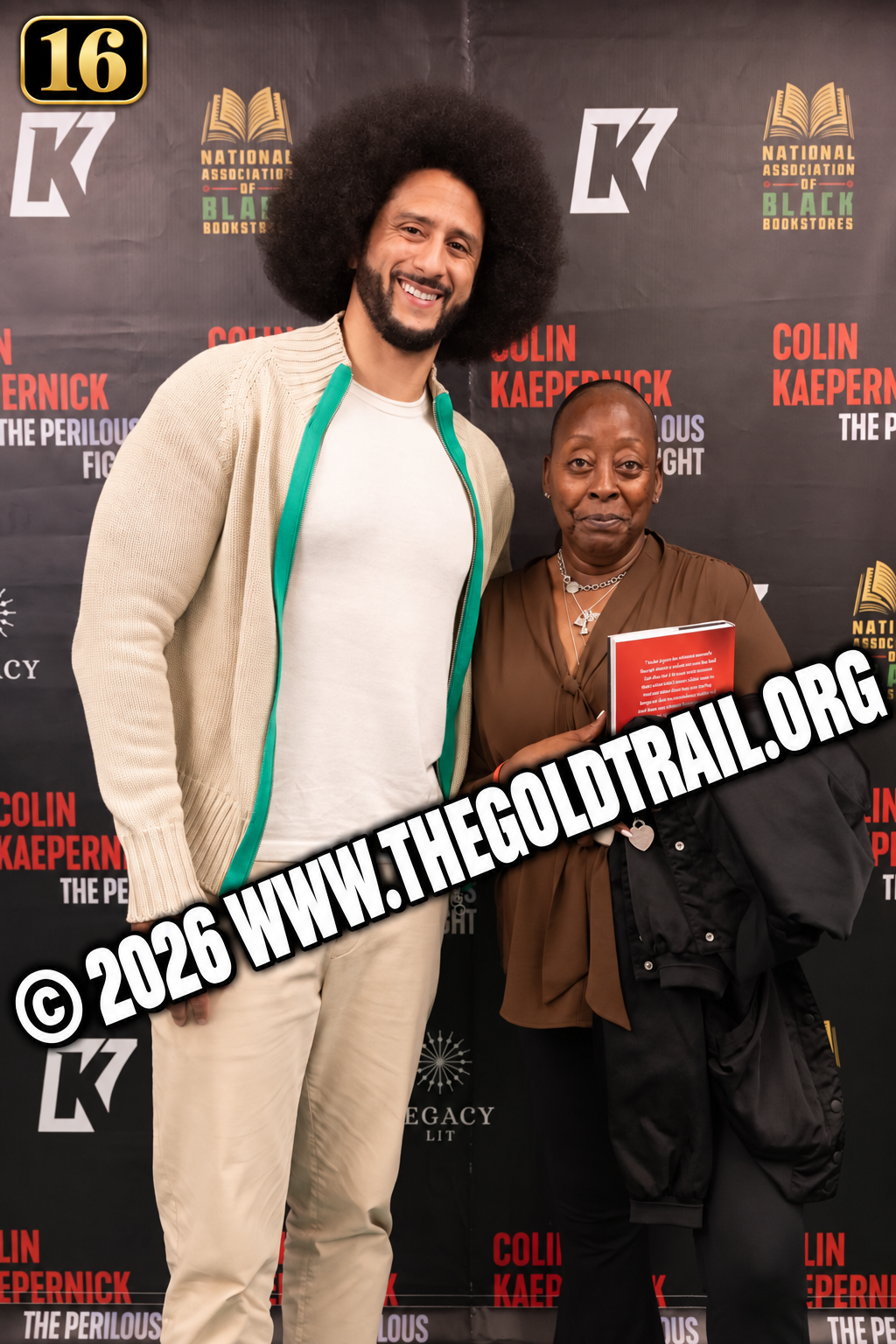 Attendees on the red carpet at the book signing event
